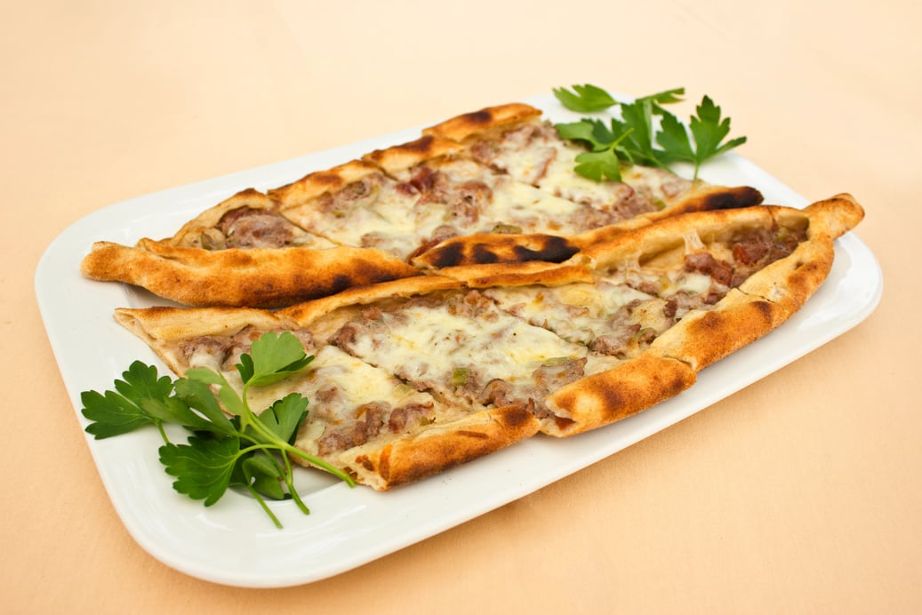 Turkish Pita with Pieces of Meat and Melted Cheese