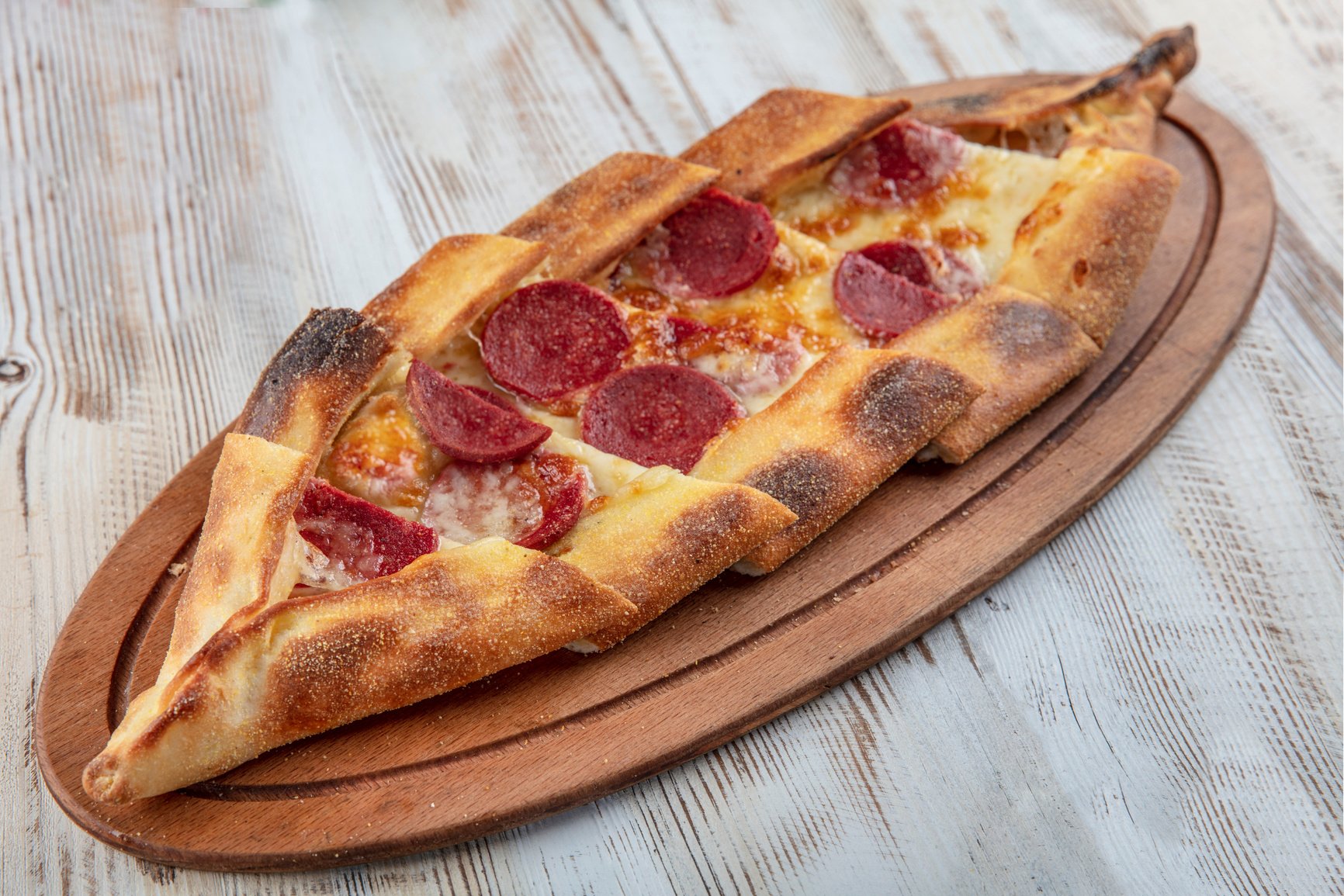 Traditional Turkish Pita; Sausage Pita.